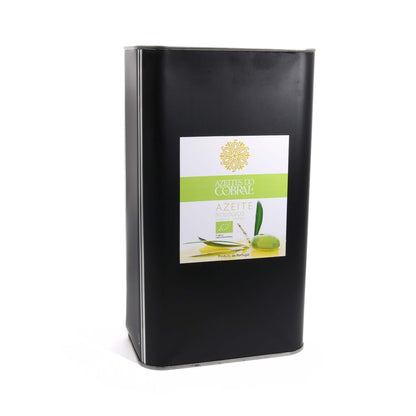 A tall black metal tin of olive oil with a white and green front label, photographed on a clean white background.